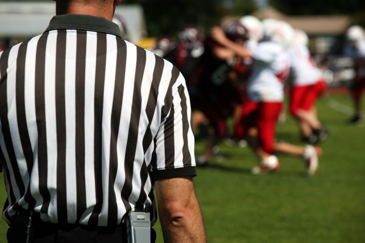 Game Officials in Team Sports: Essential Roles and Responsibilities